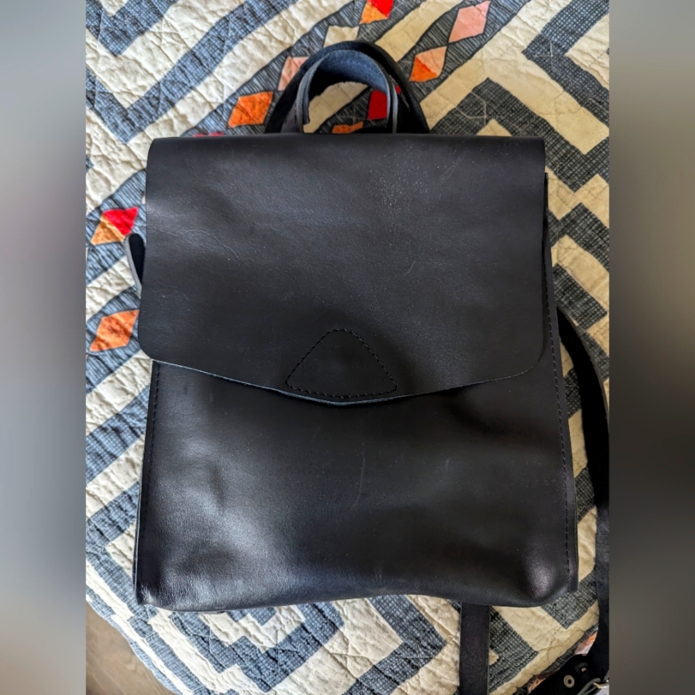 Leather back pack with adjustable straps